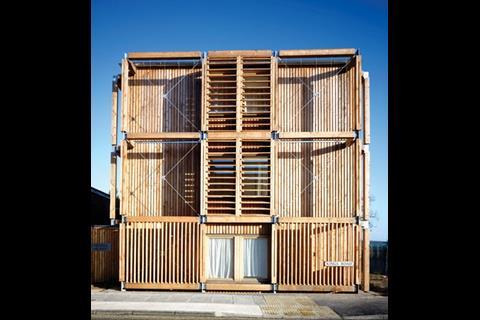 The block’s timber exterior reflects its internal spaces.